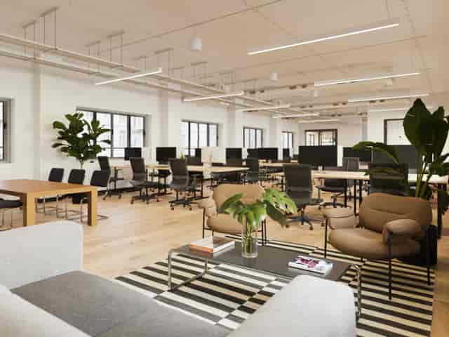 Modern flexible workspace dining room with natural light, ideal for workshops and meetings.