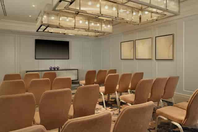Erno Rubik in a sophisticated meeting room at The Ritz-Carlton, Budapest for workshops.