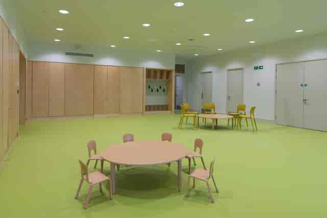Community Space in Una Marson Library with round tables, ideal for workshops and events.