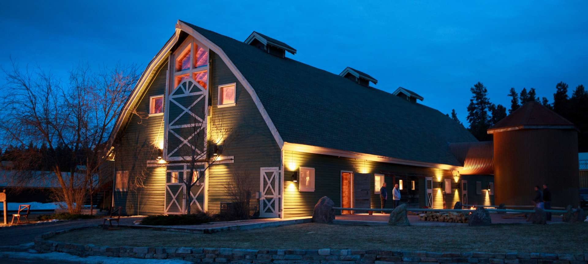 Bull Pen Patio at Paws Up: rustic barn venue with modern lighting for weddings and events.