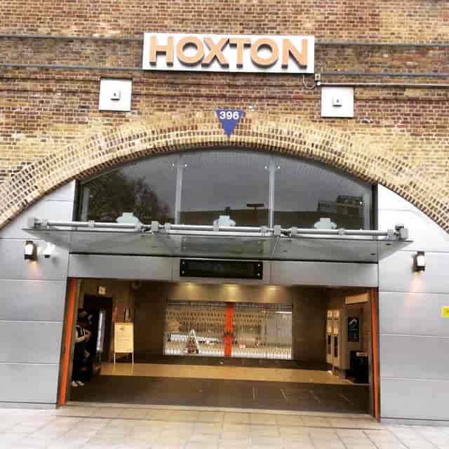 Outdoor bar space in Hoxton Arches with sleek glass facade, perfect for events and gatherings.