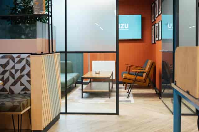 Richmond Snug glass meeting room for professional networking and corporate consultations.