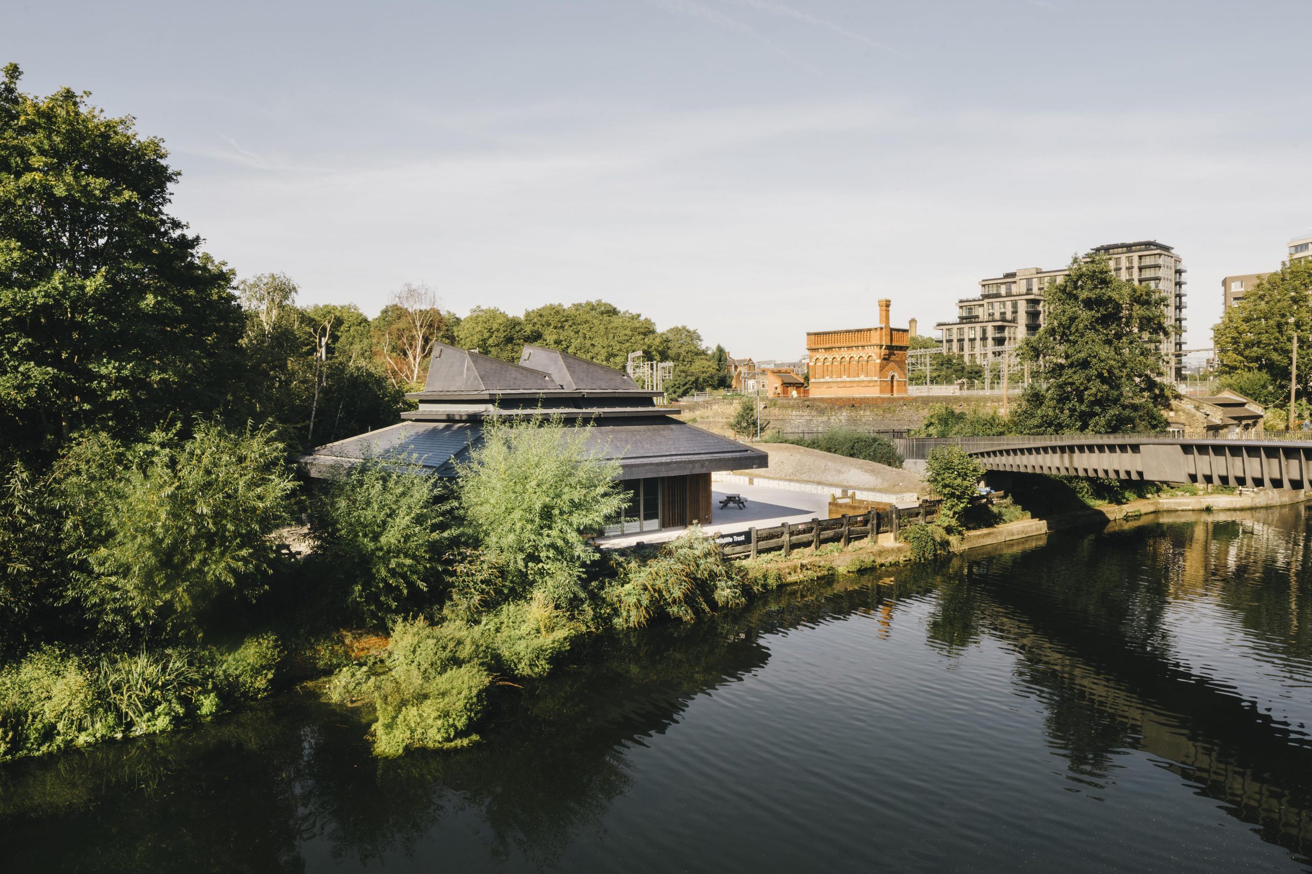Pond at Camley Street Natural Park, ideal for outdoor events and gatherings in London. - Banner