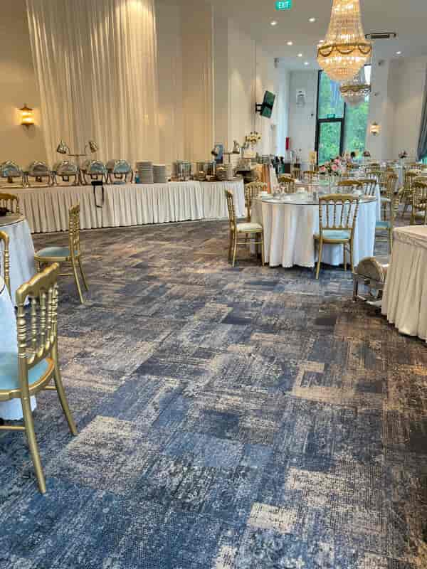 Chandelier Ballroom event space with elegant tables, perfect for celebrations and receptions.