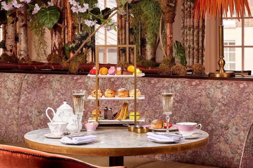 Elegant high tea setup with pastries at Richmond Hill Hotel bar area. Perfect for events.