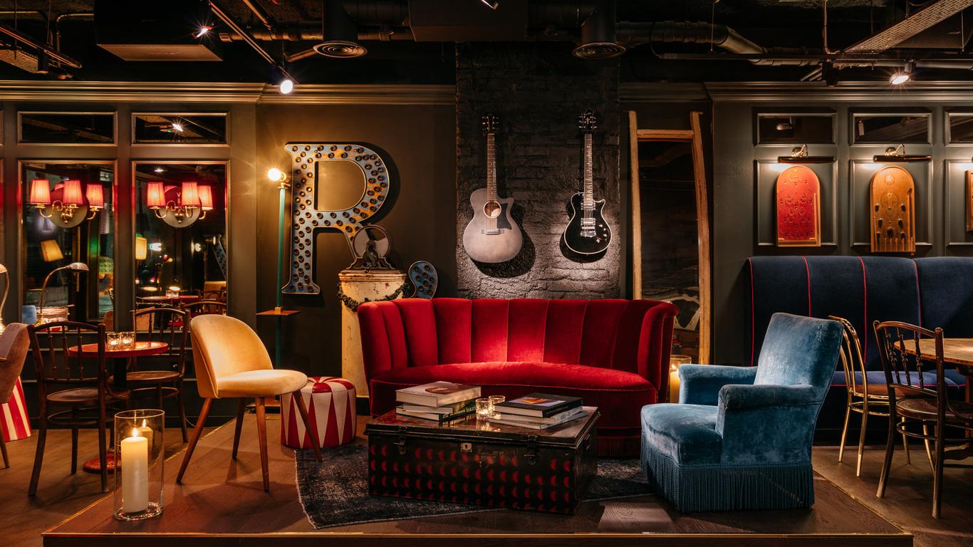Stylish lounge at Ruby Zoe Hotel & Bar, perfect for networking events and casual meetings. - Banner