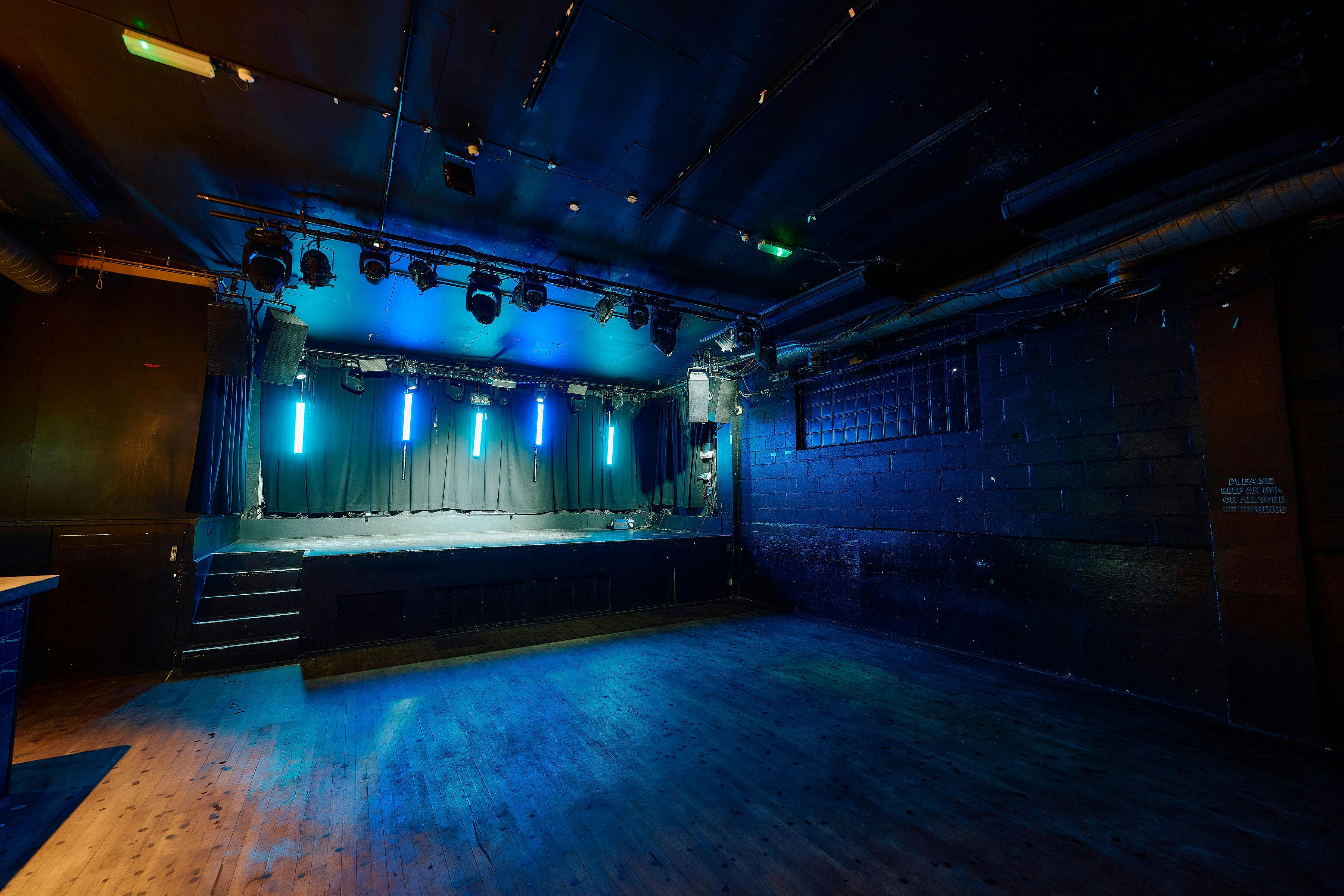 Live Room at Colours Hoxton: versatile event space with stage, ideal for concerts and presentations.