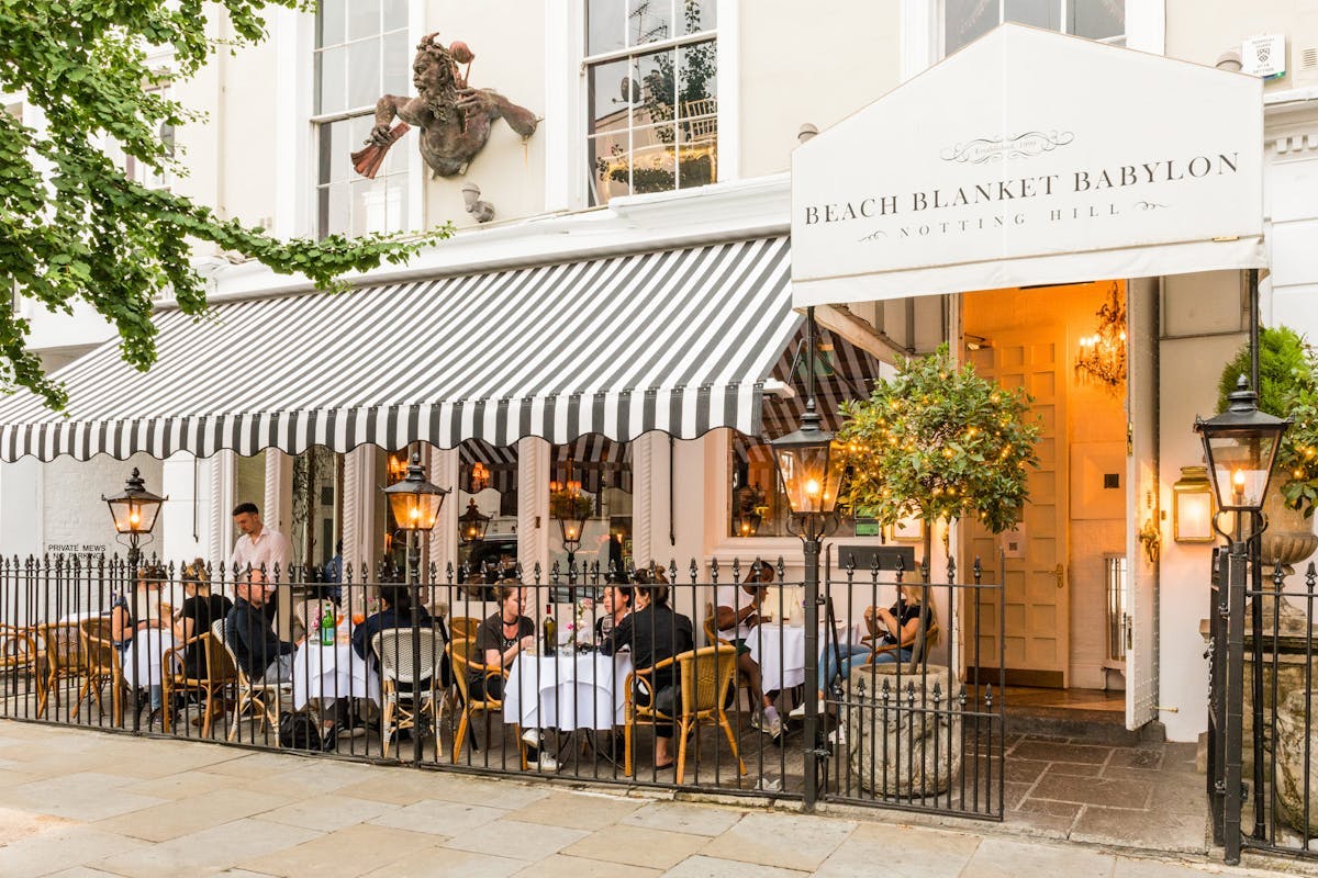 Charming outdoor dining area at Beach Blanket Babylon for events and gatherings.