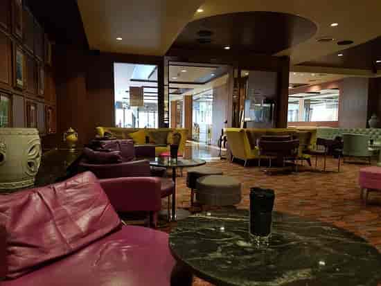 Stylish lounge bar at Hilton London Syon Park, ideal for networking events and meetings.