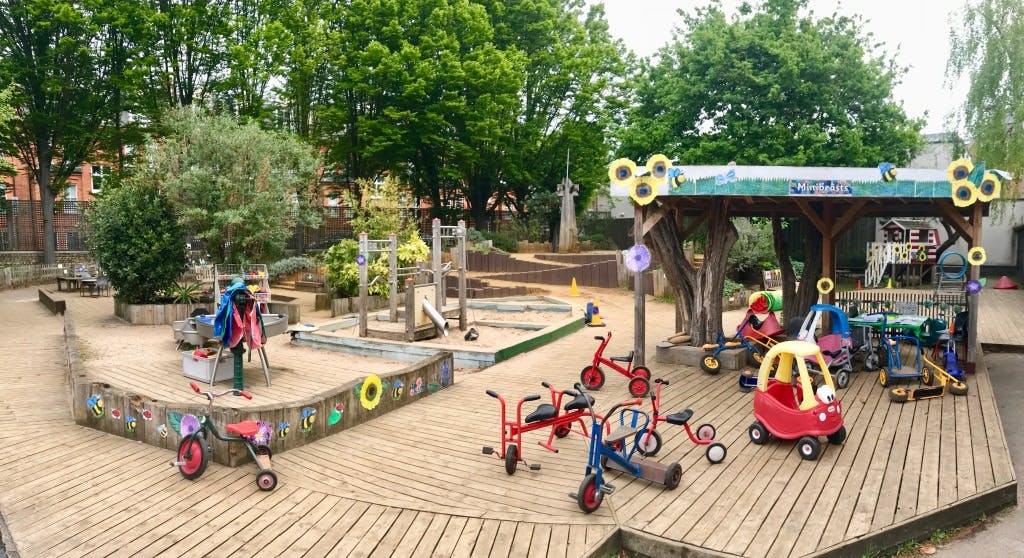 Vibrant playground with tricycles at Greenside Community Centre for family events.