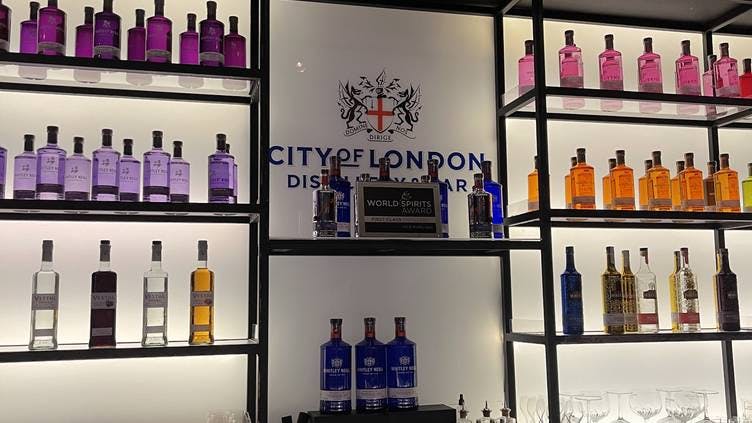 Bottle Shop display at The Distillery London, showcasing spirits for cocktail receptions.