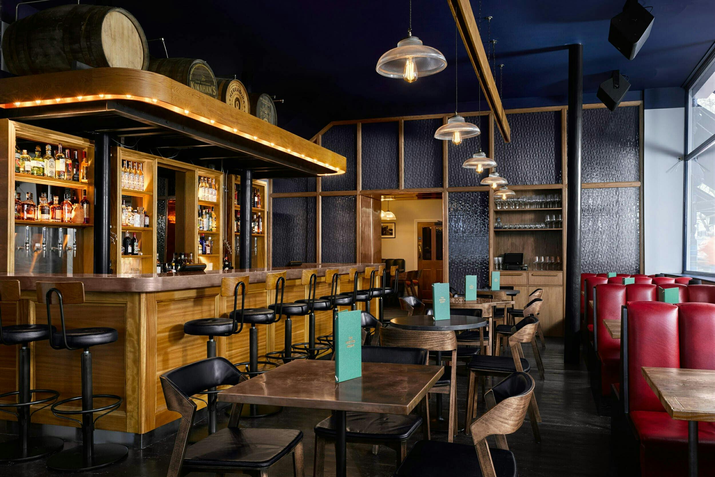 Stylish bar and dining area in The Distillery London for networking events and gatherings.