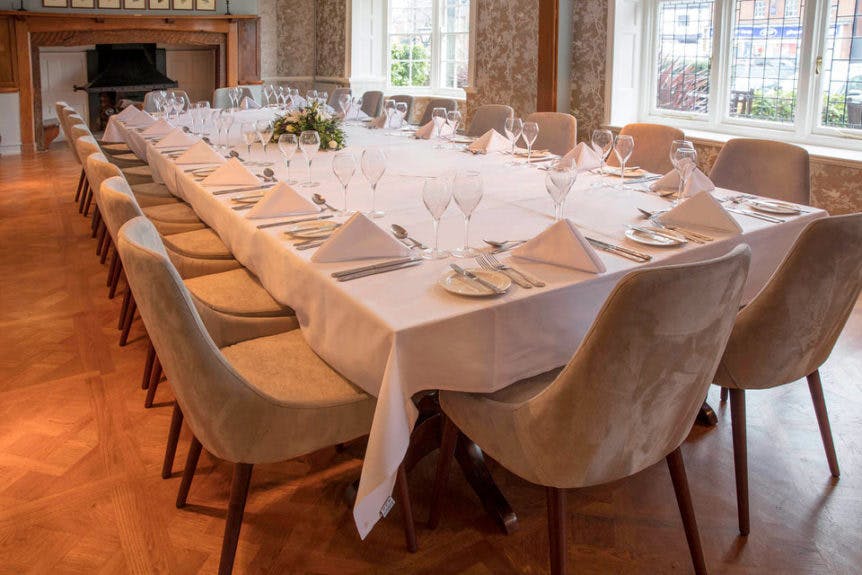 Elegant dining table in Bourchier Suite, Hotel Cromwell for corporate dinners and events.