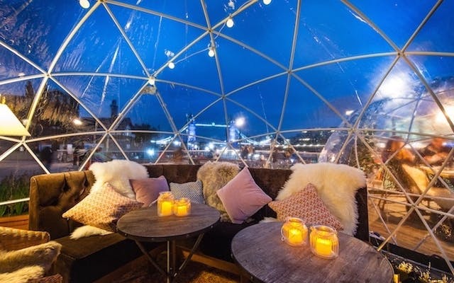 Cozy geodesic dome dining area for unique events and gatherings at The Sipping Room.