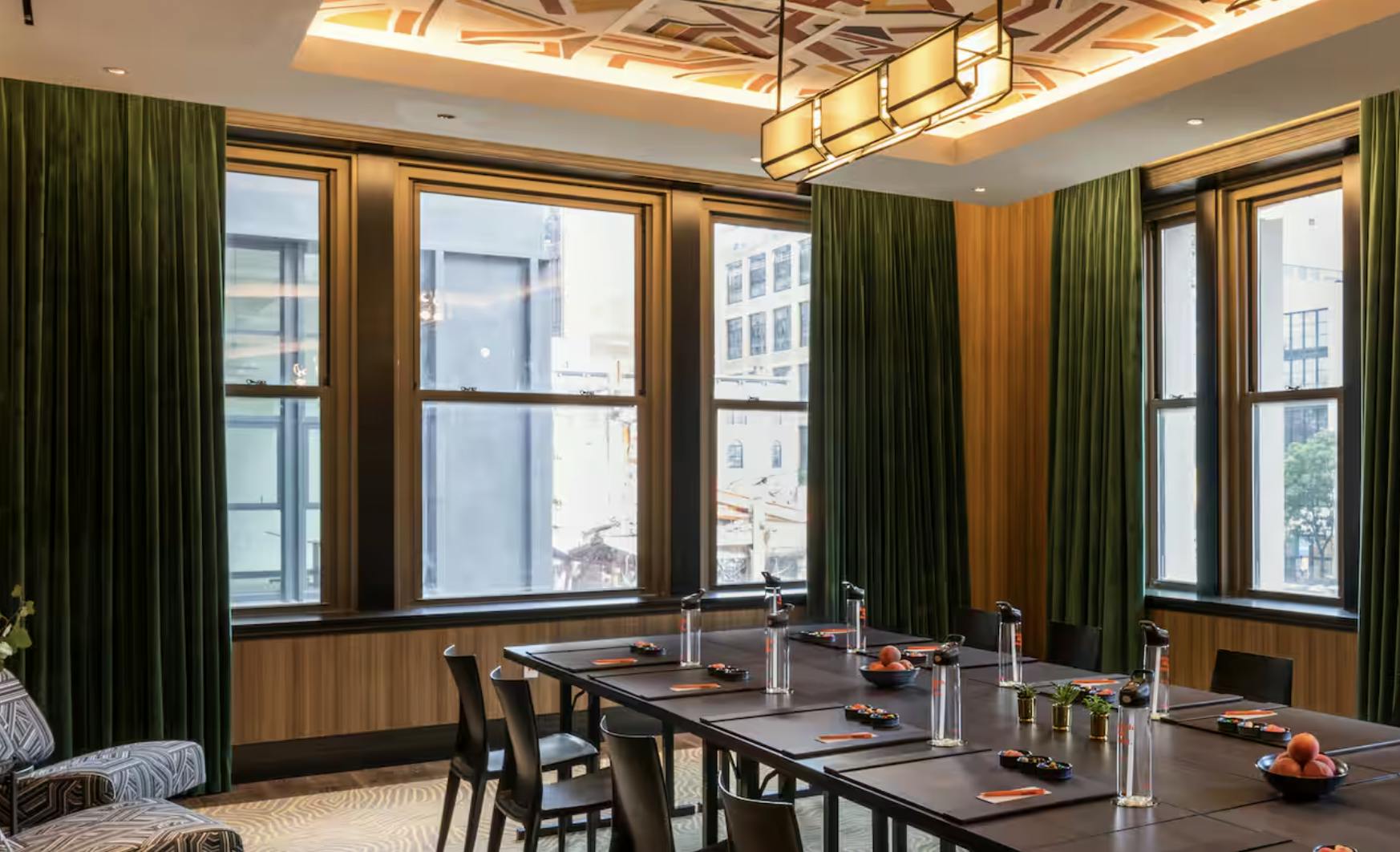 Wanamaker Room at Canopy by Hilton, elegant meeting space with natural light.