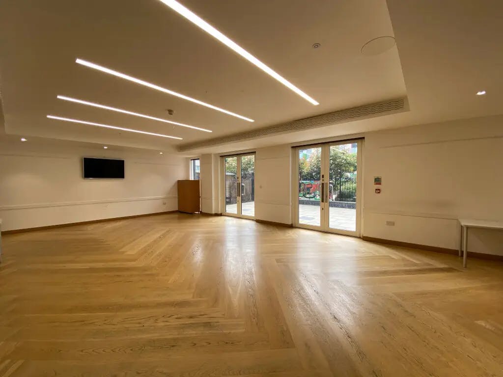 Versatile Ground Floor Hall with natural light, ideal for workshops and conferences.