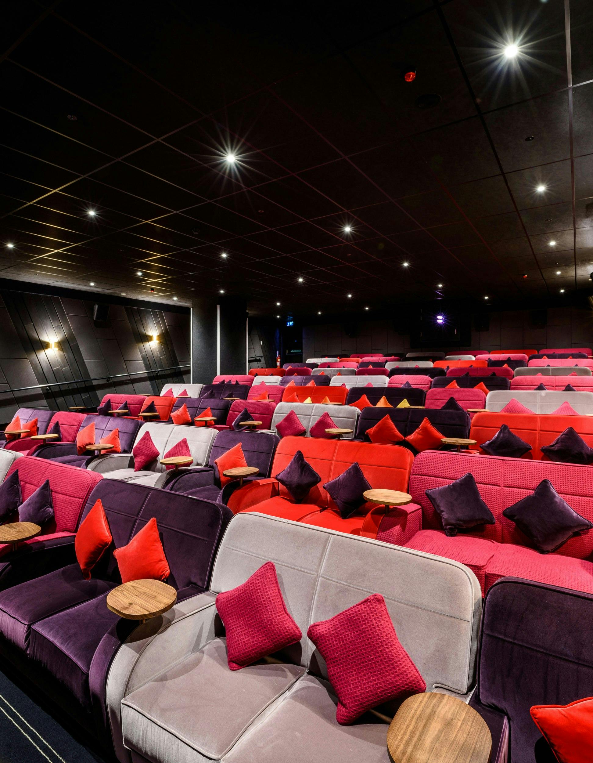 Modern auditorium with plush seating at Everyman Canary Wharf for engaging events.