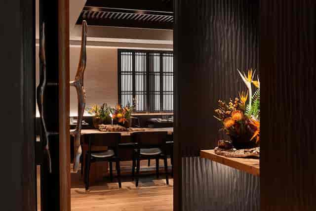 Japanese fine-dining restaurant event space with elegant floral arrangements in London.