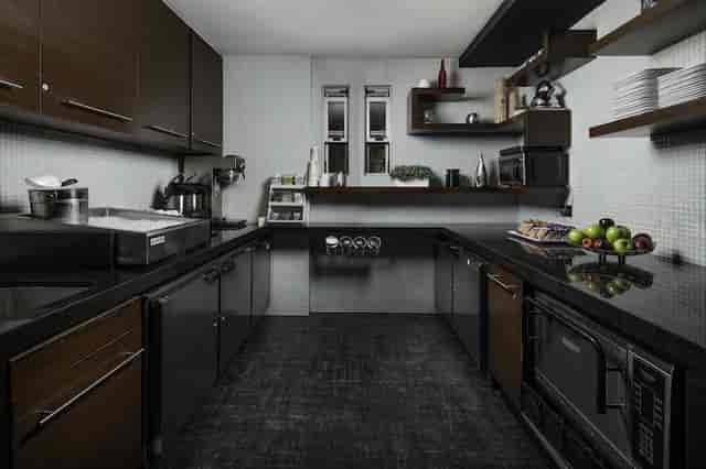 Modern kitchen in Hercor Hotel, ideal for events with sleek cabinetry and ample counter space.