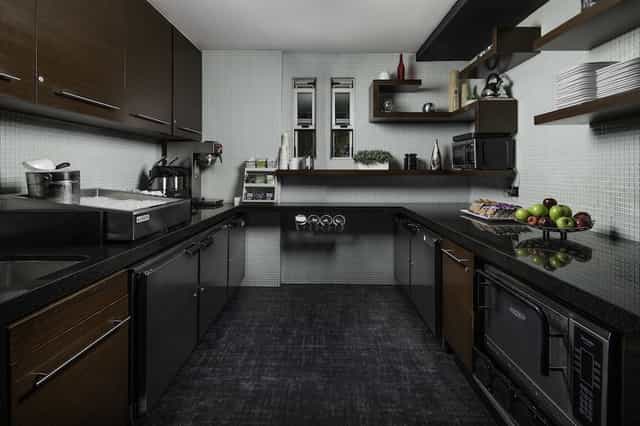 Modern kitchen in Hercor Hotel, ideal for events with sleek cabinetry and ample counter space.