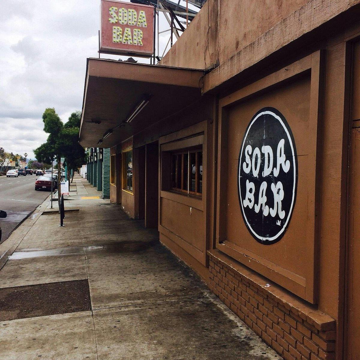 Soda Bar exterior with sign, perfect for casual gatherings and networking events.