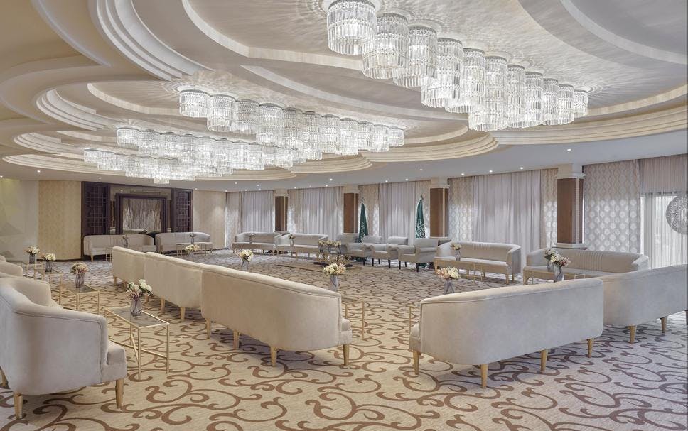 Diriyah Hall at Crowne Plaza Riyadh: elegant chandeliers for networking events.