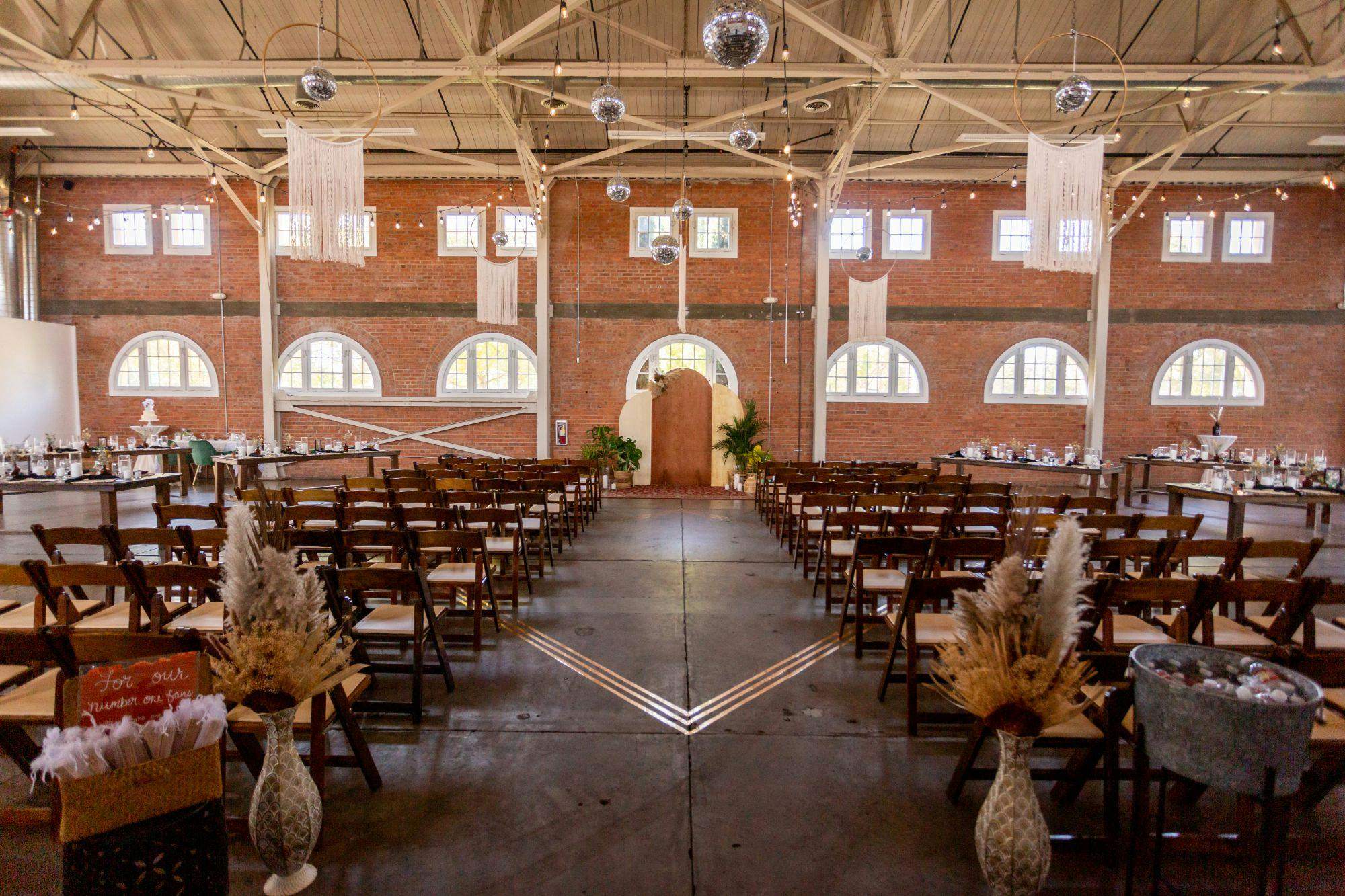 Lounge in Brick by Brick: rustic wedding venue with exposed brick and elegant decor.