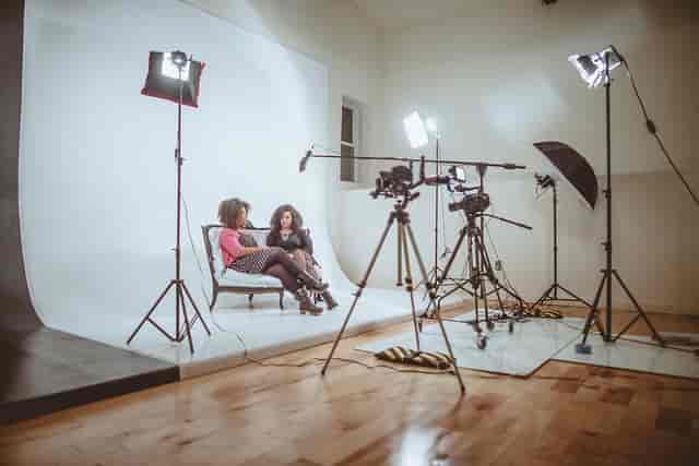 Professional interview setup in HOOKMASTER STUDIOS with strategic lighting and cameras.