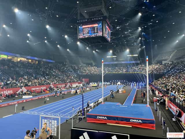 Main Arena in Accor Arena with blue track, vibrant crowd for athletic event.