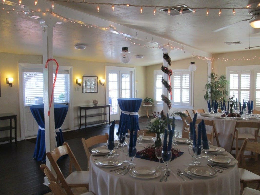 Historical Cottage event space with blue accents, ideal for gatherings and celebrations.