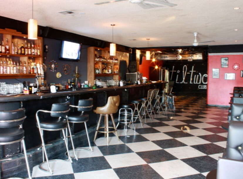 Stylish bar at Til-Two Club, perfect for networking events and casual gatherings.