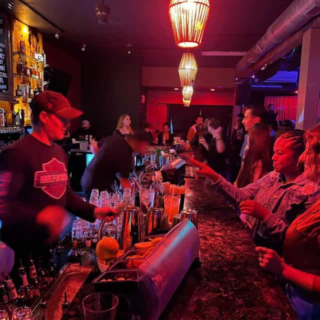 Vibrant U31 Bar scene with colorful lighting, ideal for networking events and social gatherings.