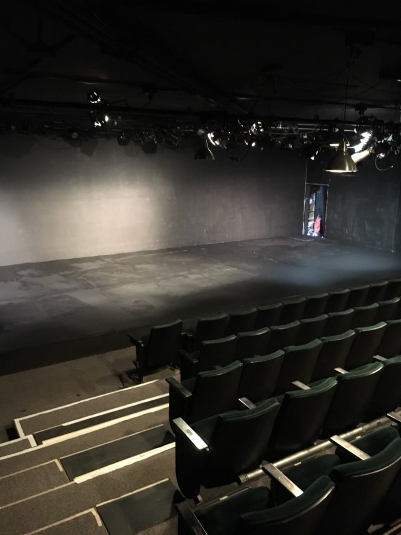 Versatile MOXIE Theatre stage for intimate performances and creative events.
