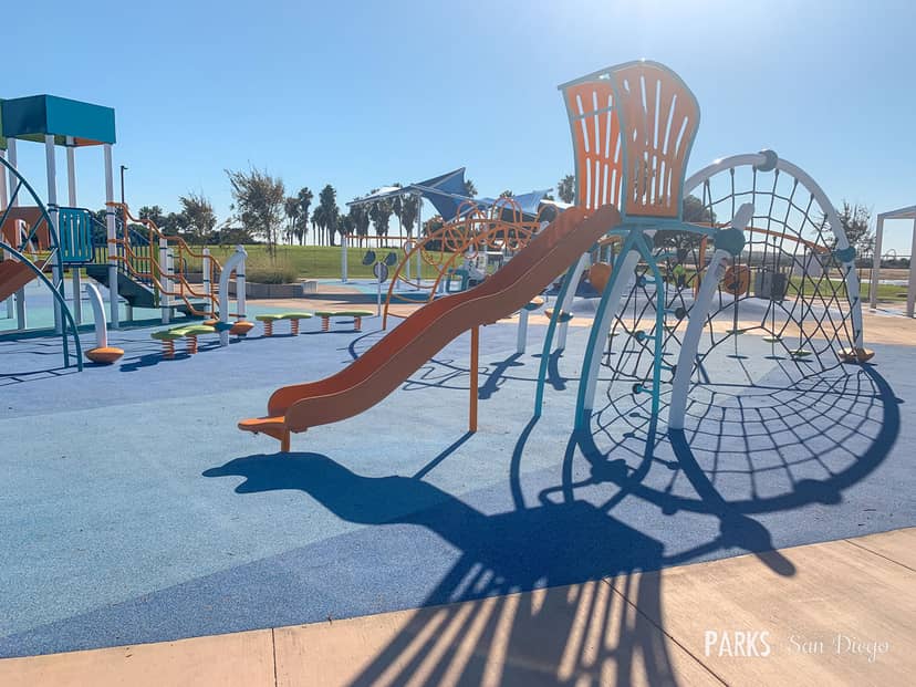 Colorful playground at Tecolote Recreation Center for family-friendly events and gatherings.