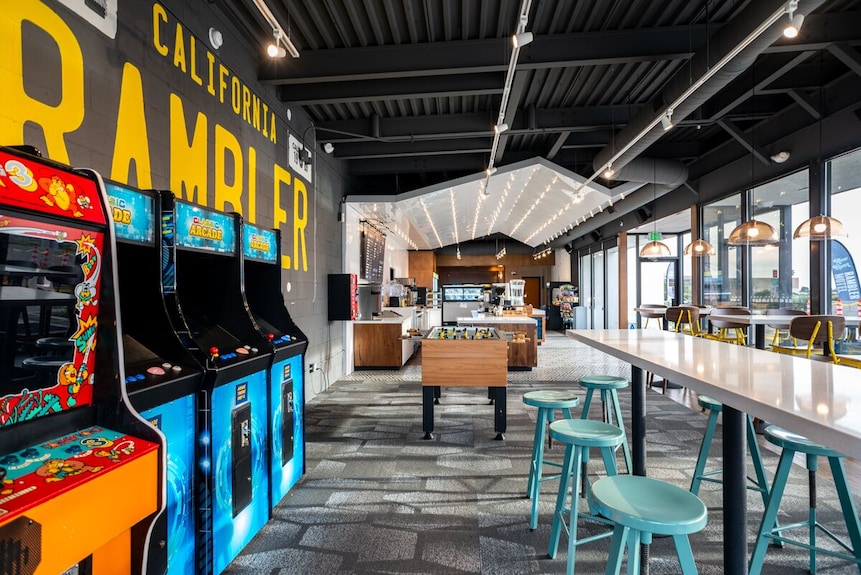 Retro Arcade at The Rambler Motel: vibrant event space with arcade games for networking.