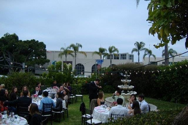 Elegant outdoor dining setup at Ocean Beach Woman's Club for social gatherings and events.