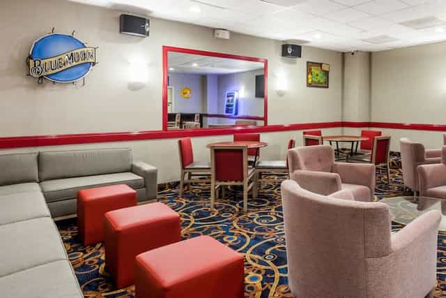 Versatile meeting room with vibrant decor for networking events in San Diego.