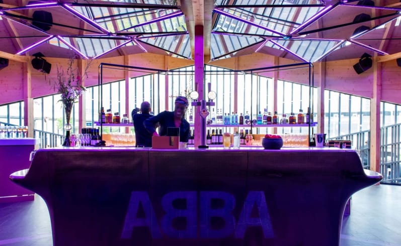 Modern bar at ABBA Voyage, ideal for corporate events and private celebrations. - Banner