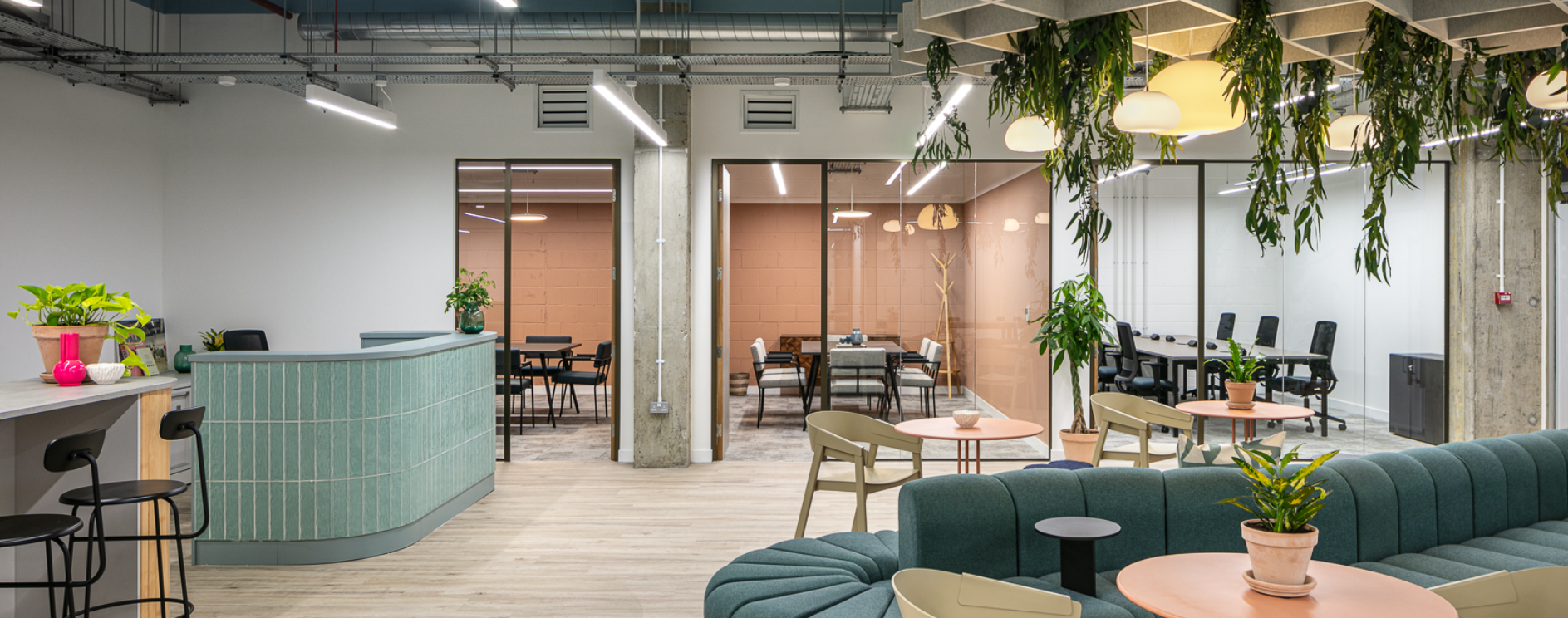 Modern meeting space in Fulham with glass-walled rooms for events and collaboration. - Banner