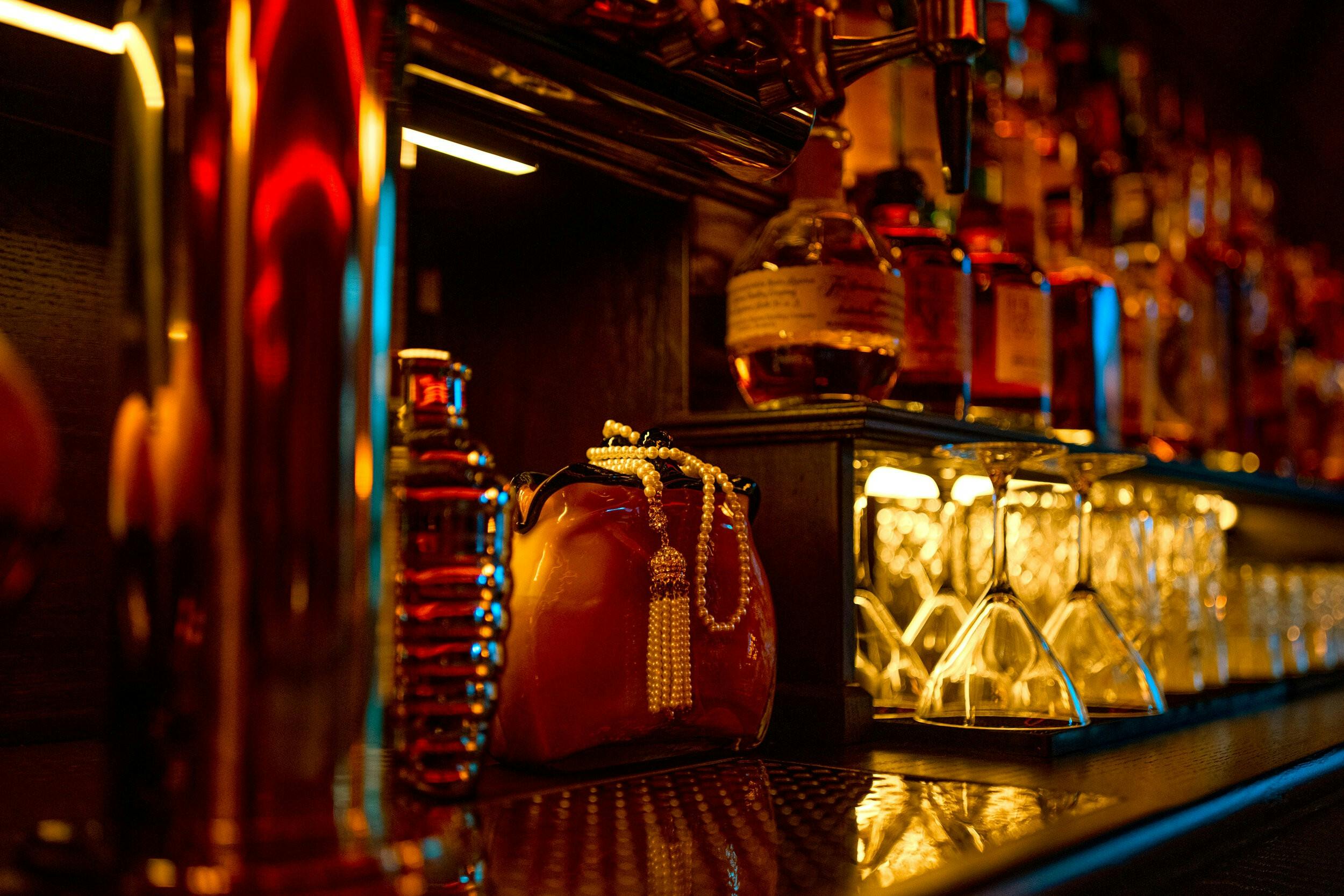 Elegant DecoDance Bar with spirits, ideal for networking and social gatherings.