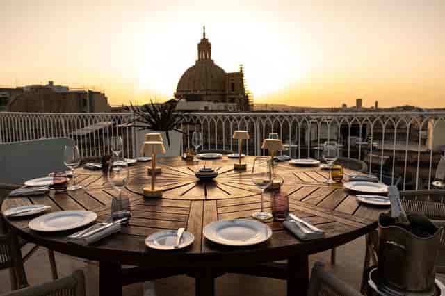 Elegant outdoor dining table at Maltese-American Social Club, perfect for upscale events.