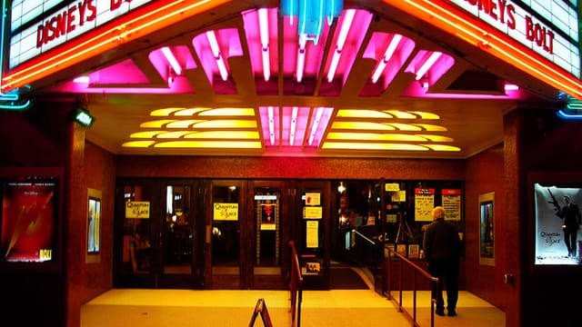 Vibrant Balboa theater entrance with neon lights, perfect for glamorous events.