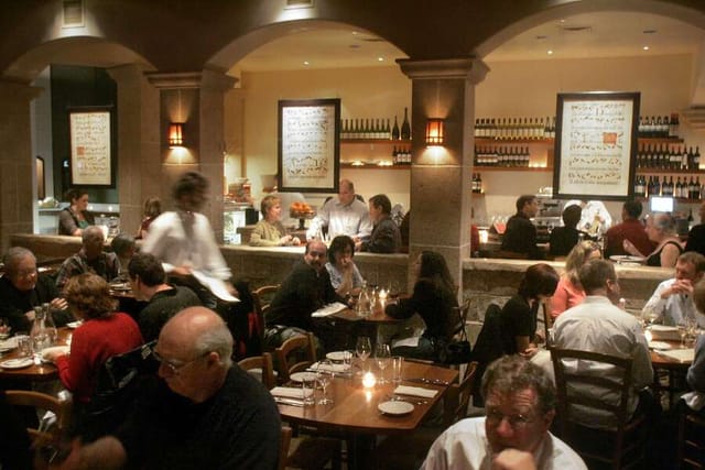 Main Dining Area at Flying Pig Bistro, warm ambiance for gatherings and events.