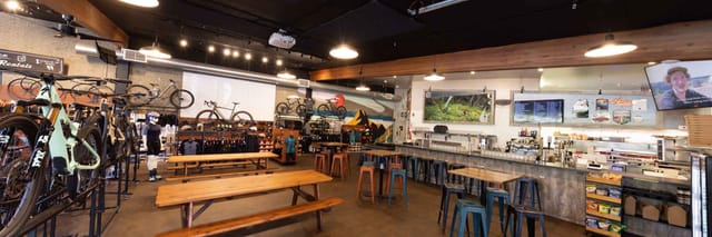 Bar at Splitrock Tap & Wheel, rustic decor, ideal for casual gatherings and workshops.