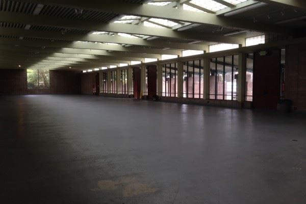 Spacious County Fair Building gallery with natural light, ideal for events and exhibitions.