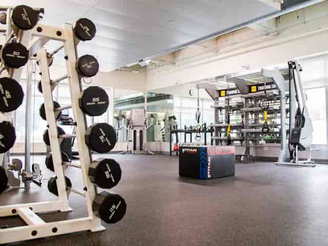 Modern fitness studio with weights at Jewish Community Center, ideal for wellness retreats.