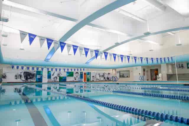 Modern indoor swimming pool at Gallanter Family Aquatics Center for aquatic events.