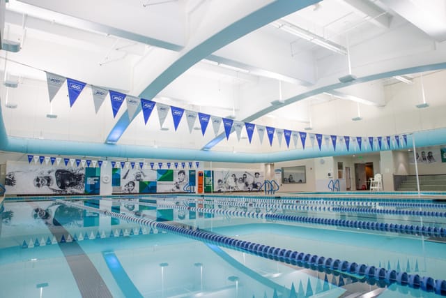Modern indoor swimming pool at Gallanter Family Aquatics Center for aquatic events.