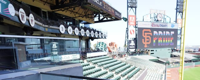 "Oracle Park Club Level: spacious venue with tiered seating for corporate events and gatherings."