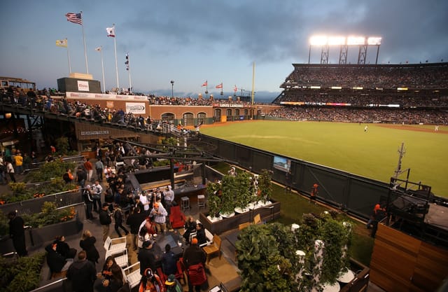 Vibrant outdoor event space at Oracle Park with casual seating and greenery for gatherings.